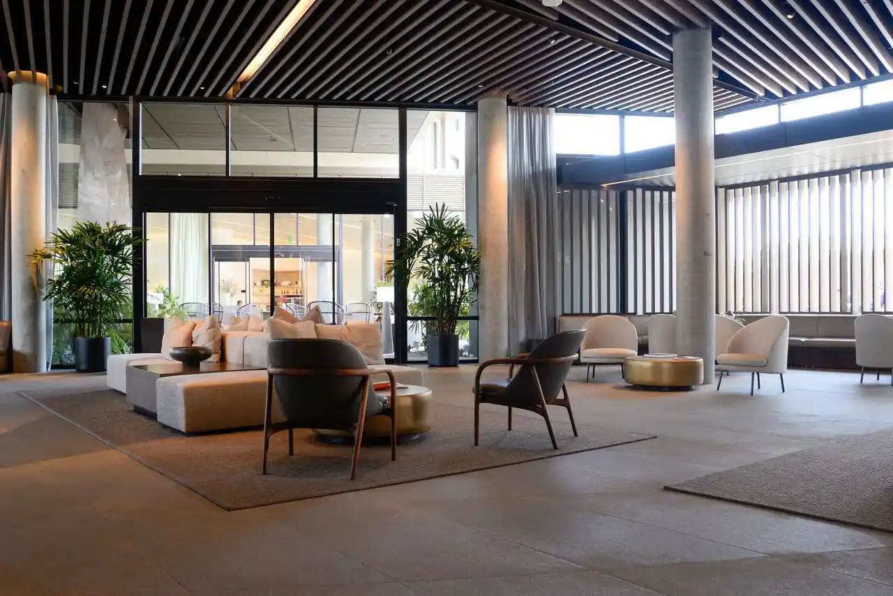 Architectural detail of Quendario Grand Haven lobby showing stone and light