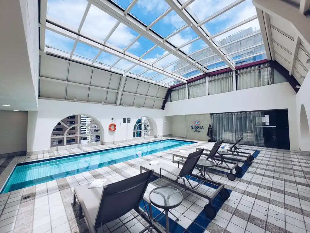 Serene indoor pool area with soft architectural lighting