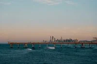 Serene view of the Gold Coast skyline at dusk across calm waters